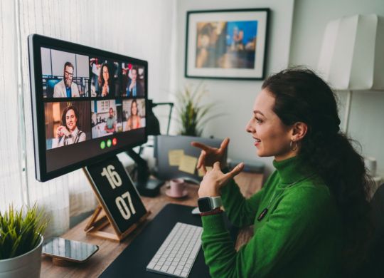 Businesspeople discussing business on virtual staff meeting during pandemic